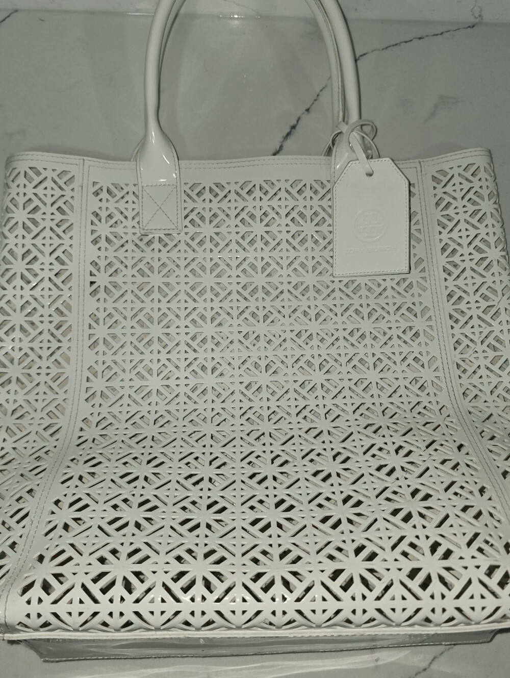 Tory Burch white laser-cut PVC and patent leather tote bag
